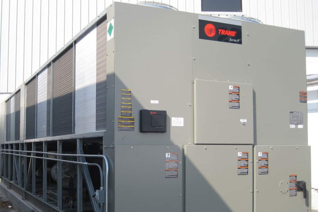 An outdoor grey central chiller designed by Process Cooling.